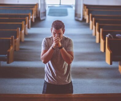 man praying church prayer pews 2179326